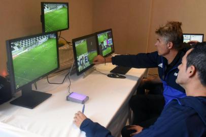 FIFA's referees are pictured during a video assistance (VAR) training course for the referees of the region, at the Conmebol's headquarters in Luque, Paraguay on September 14, 2017.The VAR will begin to be used during the semifinals and finals of the 2017 Libertadores and Sudamericana Cups. / AFP PHOTO / NORBERTO DUARTE