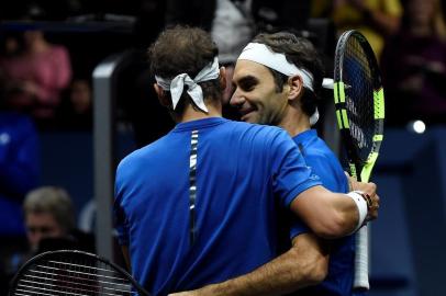  

Switzerlands Roger Federer  of Team Europe celebrates with his teammate Spains Rafael Nadal after defeating Team Worlds  Sam Querrey and Jack Sock during the second day of Laver Cup on September 23, 2017 in O2 Arena, in Prague.  / AFP PHOTO / Michal Cizek

Editoria: SPO
Local: Prague
Indexador: MICHAL CIZEK
Secao: tennis
Fonte: AFP
Fotógrafo: STR