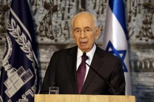 Israeli President Shimon Peres gives a joint press conference with UN Secretary General Ban Ki-moon (unseen) on July 23, 2014 at the presidential compound in Jerusalem. Ban Ki-moon demanded today that Israel and Hamas halt spiralling violence in Gaza as he pushed diplomatic efforts to end bloodshed that has killed more than 620 Palestinians. AFP PHOTO/GALI TIBBON