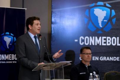 The president of the South American Football Confederation (Conmebol), Alejandro Dominguez (L), delivers a speech as Brazilian FIFAs referee instructor and Conmebols director of referees Wilson Luiz Seneme listens during a video assistant referee (VAR) training course for referees of the region, at Conmebols headquarters in Luque, Paraguay, on September 22, 2017.The VAR, footage which can be consulted by the referee on the touchlines to rule on key incidents, will be used for the first time in South America in the semifinals and final of the 2017 Libertadores Cup. / AFP PHOTO / Norberto DUARTE