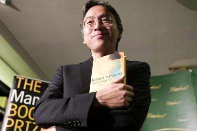  

(FILES) This file photo taken on October 10, 2005 shows British author Kazuo Ishiguro posing with his book at Hatchards book store in London, prior to the announcement of the winner of the The Man Booker Prize for Fiction.
British author Kazuo Ishiguro wins the Nobel Literature Prize, the Swedish Academy in Stockholm announced on October 5, 2017 / AFP PHOTO / LEON NEAL

Editoria: ACE
Local: London
Indexador: LEON NEAL
Secao: literature
Fonte: AFP
Fotógrafo: STF