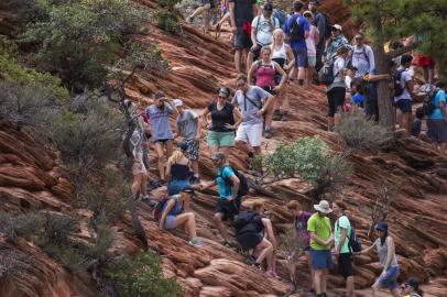 PARKS-TURKEWITZ-NSPR-100317

Visitors hike in the Virgin River at Zion National Park in southern Utah, Aug. 11, 2017. Zion is among the most visited parks in the nations system and is particularly prone to crowding. Overcrowding has put a strain on the park system already grappling with climate change and funding problems, leading to proposals to limit access. (Ruth Fremson/The New York Times)

Editoria: A
Local: ZION NATIONAL PARK
Indexador: RUTH FREMSON
Fonte: NYTNS
Fotógrafo: STF