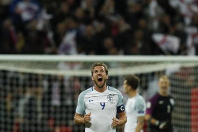 England's striker Harry Kane celebrates their 1-0 victory at the fulltime whistle during the FIFA World Cup 2018 qualification football match between England and Slovenia at Wembley Stadium in London on October 5, 2017.  / AFP PHOTO / Adrian DENNIS / NOT FOR MARKETING OR ADVERTISING USE / RESTRICTED TO EDITORIAL USE