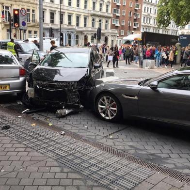 A handout picture obtained from the twitter user @StefanoSutter shows damaged vehicles on Exhibition Road, in between the Victoria and Albert (V&A) museum, and the Natural History Museum, in London on October 7, 2017, following an incident in South Kensington. 
Police arrested a man near Londons Natural History Museum on Saturday after a vehicle apparently drove into pedestrians, injuring a number of people. Crowds in the busy tourist spot in South Kensington, which is also home to the Victoria & Albert Museum and the Science Museum, fled screaming in panic, an AFP reporter said. / AFP PHOTO / @StefanoSutter / Handout / RESTRICTED TO EDITORIAL USE - MANDATORY CREDIT AFP PHOTO / STEFANO SUTTER - NO MARKETING NO ADVERTISING CAMPAIGNS - DISTRIBUTED AS A SERVICE TO CLIENTS == NO ARCHIVE
