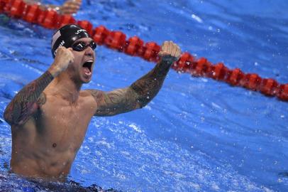 USAs Anthony Ervin celebrates after he won the Mens 50m Freestyle Final during the swimming event at the Rio 2016 Olympic Games at the Olympic Aquatics Stadium in Rio de Janeiro on August 12, 2016. 
Martin BUREAU / AFP