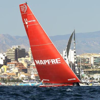 MAPFRE, Dongfeng and Vestas 11th Hour racing teams sail off the coast of Alicante, southeastern Spain, on October 14, 2017 during an in-port race ahead of the next Volvo Ocean Race, a yacht race around the world. / AFP PHOTO / JOSE JORDAN