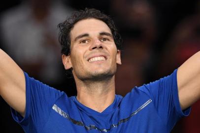 Spains Rafael Nadal celebrates winning against South Koreas Hyeon Chung during their second round match at the ATP World Tour Masters 1000 indoor tennis tournament on November 1, 2017 in Paris.
Nadal won the match 7-5, 6-3 and qualified for the third round of the tournament. / AFP PHOTO / CHRISTOPHE ARCHAMBAULT