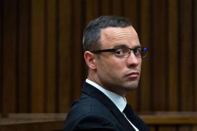  

(FILES) This picture taken on May 13, 2014 shows South African Paralympic athlete Oscar Pistorius looking on during his trial at the high court in Pretoria. Pistorius will be released on parole next week after serving one year of his five-year jail term for killing his girlfriend Reeva Steenkamp, South African media said on October 15, 2015. Oscar Pistorius to be released under correctional supervision next Tuesday, the South African Broadcasting Corporation news channel said.
AFP PHOTO / POOL / DANIEL BORN

Editoria: CLJ
Local: Pretoria
Indexador: DANIEL BORN
Secao: Trials
Fonte: POOL
Fotógrafo: STF