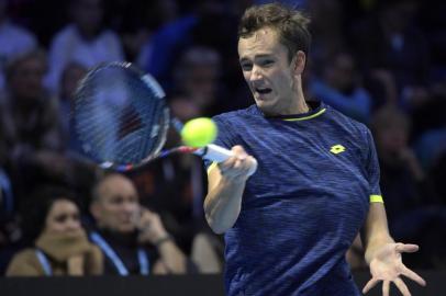 Russias Daniil Medvedev plays a return to compatriot Karen Khachanov in their Group B mens singles tennis match during the first edition of the Next Generation ATP Finals in Milan on November 7, 2017, an annual mens youth tennis tournament organized by the Italian Tennis Federation and the Italian Olympic Committee.  / AFP PHOTO / MIGUEL MEDINA