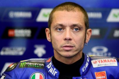 (FILES) This file photo taken on August 11, 2017 shows Movistar Yamaha MotoGPs Italian rider Valentino Rossi posing at the second practice session of the MotoGP Austrian Grand Prix weekend at Red Bull Ring in Spielberg, Austria. 
Italian motorcycling legend Valentino Rossi said on November 7, 2017 he will make a decision on his future next year but was keen to keep racing beyond 40. / AFP PHOTO / Jure Makovec