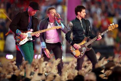 Pepsi Super Bowl 50 Halftime Show

SANTA CLARA, CA - FEBRUARY 07: (L-R) Jonny Buckland, Chris Maritn and Guy Berryman of Coldplay perform onstage during the Pepsi Super Bowl 50 Halftime Show at Levis Stadium on February 7, 2016 in Santa Clara, California.   Matt Cowan/Getty Images/AFP

Editoria: SPO
Local: Santa Clara
Indexador: Matt Cowan
Secao: American Football
Fonte: GETTY IMAGES NORTH AMERICA
Fotógrafo: STF