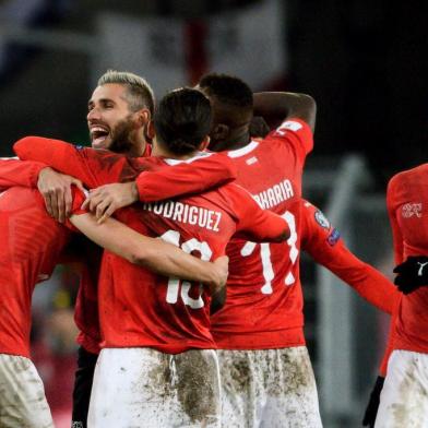  Swiss players celebrates their qualification at the end of the FIFA 2018 World Cup play-off second leg football match between Switzerland and Northern Ireland at St. at St. Jakob-Park Stadium on November 12, 2017. / AFP PHOTO / Editoria: SPOLocal: BaselIndexador: FABRICE COFFRINISecao: soccerFonte: AFPFotógrafo: STF