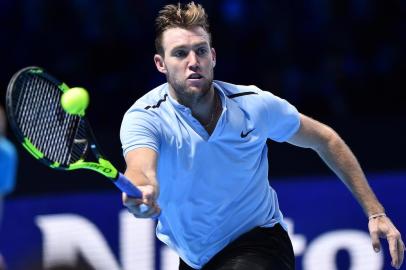  

USAs Jack Sock returns against Croatias Marin Cilic during their mens singles round-robin match on day three of the ATP World Tour Finals tennis tournament at the O2 Arena in London on November 14, 2017. / AFP PHOTO / Glyn KIRK

Editoria: SPO
Local: London
Indexador: GLYN KIRK
Secao: tennis
Fonte: AFP
Fotógrafo: STR