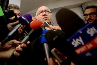 Italian Football Federation (FIGC) Carlo Tavecchio (C) speaks to journalists outside the Italian Football Federation (FIGC) headquarters on November 15 2017, in Rome.
Gian Piero Ventura was sacked as Italy coach today after the four-time champions failed to reach the World Cup finals. The veteran coachs fate was sealed after a crisis meeting of the Italian Football Federation (FIGC) in Rome. The 69-year-old had refused to resign despite a 1-0 aggregate play-off defeat to Sweden on Monday saw Italy miss the World Cup for the first time in 60 years. / AFP PHOTO / Filippo MONTEFORTE