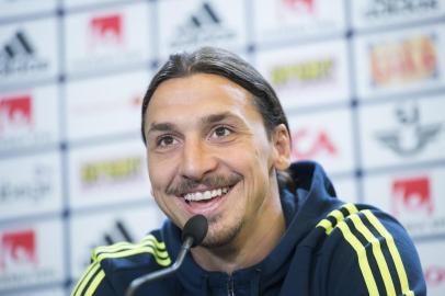 (FILES) This file photo taken on June 1, 2016 shows then Swedens forward and team captain Zlatan Ibrahimovic attending a press conference in Bastad, Sweden, as part of preparations for the upcoming Euro 2016 European football championships.After Swedens Miracle of Milan booked them a berth at the World Cup finals and sent Italy crashing out on November 14, 2017, could Zlatan Ibrahimovic be set for a return from international retirement? In the minutes after the Swedes hung on for a goalless draw on Monday that secured one of the big World Cup upsets, Ibrahimovic wrote We are Zweden on Instagram next to a photo of the delighted team, deliberately adding the Z of his name to his countrys. / AFP PHOTO / JONATHAN NACKSTRAND