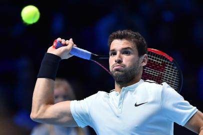  

Bulgaria's Grigor Dimitrov returns to Belgium's David Goffin during their men's singles final match on day eight of the ATP World Tour Finals tennis tournament at the O2 Arena in London on November 19, 2017. / AFP PHOTO / Glyn KIRK

Editoria: SPO
Local: London
Indexador: GLYN KIRK
Secao: tennis
Fonte: AFP
Fotógrafo: STR