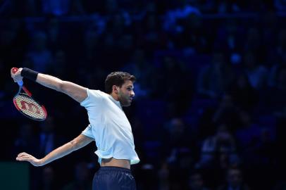  

Bulgaria's Grigor Dimitrov returns to Belgium's David Goffin during their men's singles final match on day eight of the ATP World Tour Finals tennis tournament at the O2 Arena in London on November 19, 2017. / AFP PHOTO / Glyn KIRK

Editoria: SPO
Local: London
Indexador: GLYN KIRK
Secao: tennis
Fonte: AFP
Fotógrafo: STR