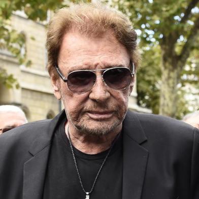  

French singer Johnny Hallyday arrives at the Saint-Sulpice church to attend the funeral of late actress Mireille Darc on September 1, 2017 in Paris. 
Mireille Darc died at age 79 on August 28, 2017, according to her family. / AFP PHOTO / BERTRAND GUAY

Editoria: HUM
Local: Paris
Indexador: BERTRAND GUAY
Secao: celebrity
Fonte: AFP
Fotógrafo: STF