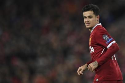  Liverpools Brazilian midfielder Philippe Coutinho celebrates scoring their fifth goal and completing his hattrick during the UEFA Champions League Group E football match between Liverpool and Spartak Moscow at Anfield in Liverpool, north-west England on December 6, 2017. / AFP PHOTO /Editoria: SPOLocal: LiverpoolIndexador: PAUL ELLISSecao: soccerFonte: AFPFotógrafo: STF