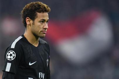 Paris Saint-Germains Brazilian forward Neymar reacts during the UEFA Champions League football match of Bayern Munich vs Paris Saint-Germain on December 5, 2017 in Munich, southern Germany. / AFP PHOTO / Christof STACHE