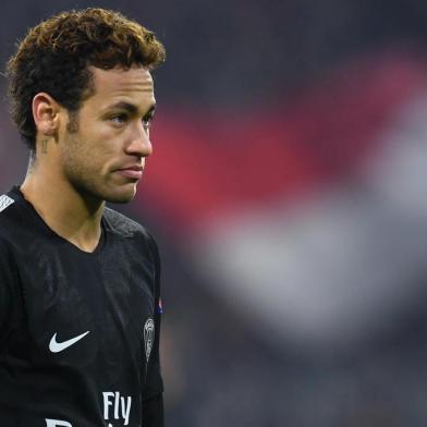 Paris Saint-Germains Brazilian forward Neymar reacts during the UEFA Champions League football match of Bayern Munich vs Paris Saint-Germain on December 5, 2017 in Munich, southern Germany. / AFP PHOTO / Christof STACHE