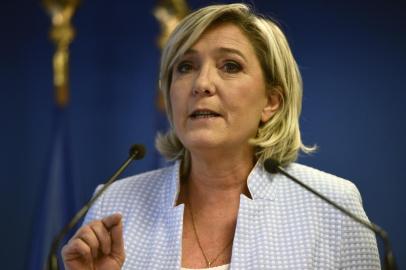 President of the French far-right party and presidential candidate for the 2017 French Presidential elections Marine Le Pen delivers a speech during a press conference on november 9, 2016 in the party headquarters inNanterre, near Paris, following the victory by US Republican candidate Donald Trump in US presidential elections. Marine Le Pen said on November 9, 2016 that Donald Trump's election to the US presidency was "good news" for France in a speech. Donald Trump has stunned America and the world,  riding a wave of populist resentment to defeat Hillary Clinton in the race to become the 45th president of the United States. The Republican mogul defeated his Democratic rival, plunging global markets into turmoil and casting the long-standing global political order, which hinges on Washington's leadership, into doubt.Martin BUREAU / AFP