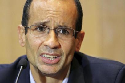 Brazils construction giant Odebrecht president Marcelo Odebrecht speaks during a hearing of the parliamentary committee of the Petrobras investigation in the Federal Justice court, in Curitiba on September 1st, 2015. Odebrecht is accused of corruption, money laundering and criminal association within the framework of the Lava Jato operation.    AFP PHOTO / HEULER ANDREY