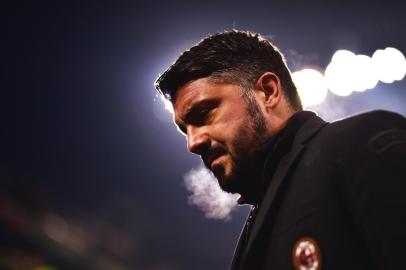 AC Milans head coach Gennaro Gattuso looks on during the Italian Serie A football match AC Milan Vs Bologna on December 10, 2017 at the San Siro Stadium in Milan.  / AFP PHOTO / MARCO BERTORELLO