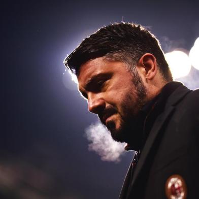 AC Milans head coach Gennaro Gattuso looks on during the Italian Serie A football match AC Milan Vs Bologna on December 10, 2017 at the San Siro Stadium in Milan.  / AFP PHOTO / MARCO BERTORELLO