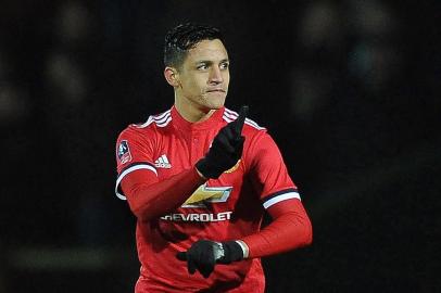 Manchester Uniteds Chilean striker Alexis Sanchez gestures during the FA Cup fourth round football match between Yeovil Town and Manchester United at Huish Park in Yeovil, Somerset on January 26, 2018. / AFP PHOTO / - / RESTRICTED TO EDITORIAL USE. No use with unauthorized audio, video, data, fixture lists, club/league logos or live services. Online in-match use limited to 75 images, no video emulation. No use in betting, games or single club/league/player publications.  / 