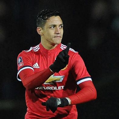 Manchester United's Chilean striker Alexis Sanchez gestures during the FA Cup fourth round football match between Yeovil Town and Manchester United at Huish Park in Yeovil, Somerset on January 26, 2018. / AFP PHOTO / - / RESTRICTED TO EDITORIAL USE. No use with unauthorized audio, video, data, fixture lists, club/league logos or 'live' services. Online in-match use limited to 75 images, no video emulation. No use in betting, games or single club/league/player publications.  / 