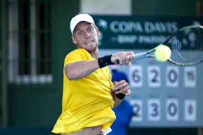 Brazils Joao Pedro Sorgi returns the ball to Dominican tennis player Jose Hernandez (out of frame) during their Davis Cup mens singles tennis match in Santo Domingo, on February 2, 2018.  / AFP PHOTO / Erika SANTELICES