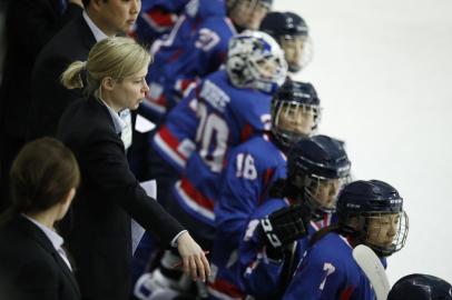 Sarah Murray (L), head coach of the Unified Korean team, looks on during a womens ice hockey practice match between Sweden and a Unified Korean team in Incheon on February 4, 2018 ahead of the Pyeongchang 2018 Winter Olympic Games.The Unified Korean womens ice hockey team had their first and only practice match against Sweden at Incheon ahead of the start of the Games. / AFP PHOTO / POOL / KIM HONG-JI