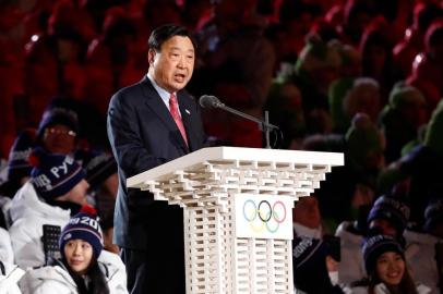 President and CEO of PyeongChang Organizing Committee Lee Hee-beom speaks during the opening ceremony of the Pyeongchang 2018 Winter Olympic Games at the Pyeongchang Stadium on February 9, 2018. / AFP PHOTO / Odd ANDERSEN