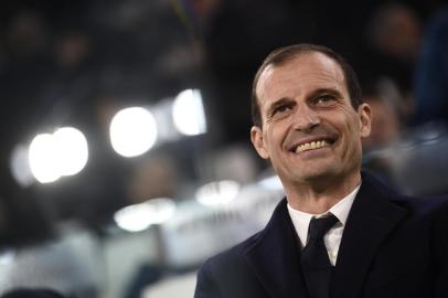 Juventus coach from Italy Massimiliano Allegri looks on during the UEFA Champions League round of sixteen first leg football match between Juventus and Tottenham Hotspur at The Allianz Stadium in Turin on February 13, 2018.  / AFP PHOTO / Marco BERTORELLO