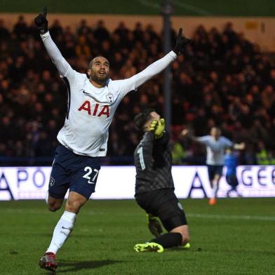 Tottenham Hotspurs Brazilian midfielder Lucas Moura celebrates after scoring their first goal during the English FA Cup fifth round football match between Rochdale and Tottenham Hotspur at the Crown Oil Arena in Rochdale, north west England on February 18, 2018. / AFP PHOTO / Oli SCARFF / RESTRICTED TO EDITORIAL USE. No use with unauthorized audio, video, data, fixture lists, club/league logos or live services. Online in-match use limited to 75 images, no video emulation. No use in betting, games or single club/league/player publications.  / 