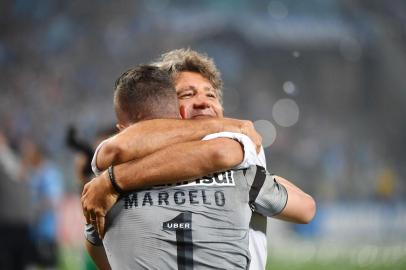  Brazil's Gremio coach Renato gaucho celebrates with goalkeeper Marcelo Grohe after defeating by penalty shoots against Argentina's Independiente, during their Recopa Sudamericana 2018 final match held at  Arena Gremio, in Porto Alegre, Brazil, on February 21, 2018. / AFP PHOTO / NELSON ALMEIDAEditoria: SPOLocal: Porto AlegreIndexador: NELSON ALMEIDASecao: soccerFonte: AFPFotógrafo: STF