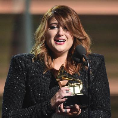 6042247301Singer Meghan Trainor recieves the award for the Best New Artist onstage during the 58th Annual Grammy music Awards in Los Angeles February 15, 2016.  AFP PHOTO/  ROBYN BECK / AFP / ROBYN BECKEditoria: ACELocal: Los AngelesIndexador: ROBYN BECKSecao: musicFonte: AFPFotógrafo: STF