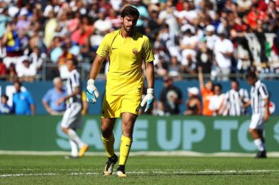 FOXBORO, MA - JULY 30: Alisson Becker #1 of Roma reacts after being scored on by Mario Mandzukic #17 of Juventus during the International Champions Cup 2017 match at Gillette Stadium on July 30, 2017 in Foxboro, Massachusetts.   Maddie Meyer/Getty Images/AFP