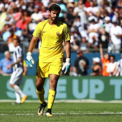 FOXBORO, MA - JULY 30: Alisson Becker #1 of Roma reacts after being scored on by Mario Mandzukic #17 of Juventus during the International Champions Cup 2017 match at Gillette Stadium on July 30, 2017 in Foxboro, Massachusetts.   Maddie Meyer/Getty Images/AFP