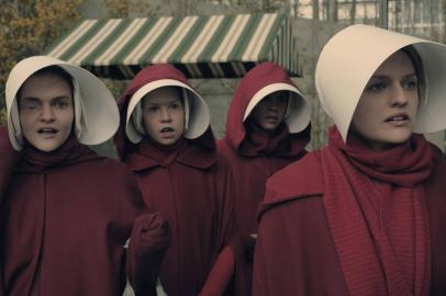 The Handmaid's Tale  -- "Faithful" -- Episode 105 --  Serena Joy makes Offred a surprising proposition. Offred remembers the unconventional beginnings of her relationship with her husband. Janine (Madeline Brewer), left and Offred (Elisabeth Moss), right, shown. (Photo by: George Kraychyk/Hulu)