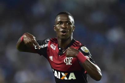  Brazil's Flamengo Vinicius Junior celebrates his goal against Emelec of Ecuador during their Copa Libertadores 2018 football match at George Capwell stadium in Guayaquil, Ecuador, on March 14, 2018. / AFP PHOTO / Editoria: SPOLocal: GuayaquilIndexador: RODRIGO BUENDIASecao: soccerFonte: AFPFotógrafo: STF