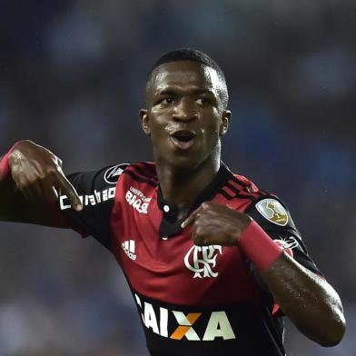  Brazil's Flamengo Vinicius Junior celebrates his goal against Emelec of Ecuador during their Copa Libertadores 2018 football match at George Capwell stadium in Guayaquil, Ecuador, on March 14, 2018. / AFP PHOTO / Editoria: SPOLocal: GuayaquilIndexador: RODRIGO BUENDIASecao: soccerFonte: AFPFotógrafo: STF