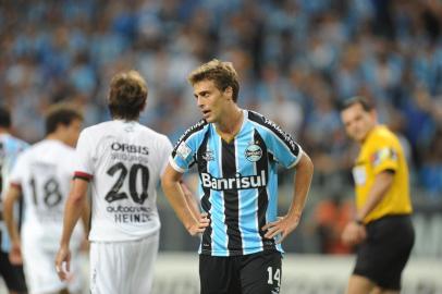  PORTO ALEGRE,BRASIL,RS - 13/03/2014 - Libertadores 2014, 1ª Fase - Grêmio x Newells Old Boys no estádio Arena.(FOTO: DIEGO VARA/AGÊNCIA RBS)Jogaor Maxi Rodríguez