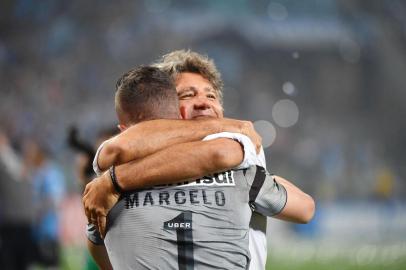  Brazil's Gremio coach Renato gaucho celebrates with goalkeeper Marcelo Grohe after defeating by penalty shoots against Argentina's Independiente, during their Recopa Sudamericana 2018 final match held at  Arena Gremio, in Porto Alegre, Brazil, on February 21, 2018. / AFP PHOTO / NELSON ALMEIDAEditoria: SPOLocal: Porto AlegreIndexador: NELSON ALMEIDASecao: soccerFonte: AFPFotógrafo: STF