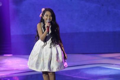 Mariah Yohana, cantando  ¿Uni Duni Tê¿, do Trem da Alegria, no The Voice Kids