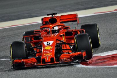 Ferraris German driver Sebastian Vettel drives during the second practice session ahead of the qualifiers for the Bahrain Formula One Grand Prix at the Sakhir circuit in Manama on April 6, 2018.  / AFP PHOTO / GIUSEPPE CACACE