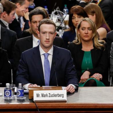 Facebook chief Zuckerberg testifies to lawmakers after data hijacking scandalFacebook founder and CEO Mark Zuckerberg arrives to testify during a Senate Commerce, Science and Transportation Committee and Senate Judiciary Committee joint hearing about Facebook on Capitol Hill in Washington, DC, April 10, 2018. / AFP PHOTO / POOL / ALEX BRANDONEditoria: FINLocal: WashingtonIndexador: ALEX BRANDONSecao: electionFonte: POOLFotógrafo: STR