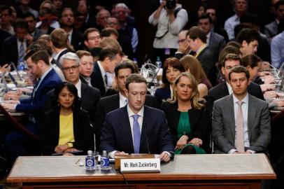 Facebook chief Zuckerberg testifies to lawmakers after data hijacking scandalFacebook founder and CEO Mark Zuckerberg arrives to testify during a Senate Commerce, Science and Transportation Committee and Senate Judiciary Committee joint hearing about Facebook on Capitol Hill in Washington, DC, April 10, 2018. / AFP PHOTO / POOL / ALEX BRANDONEditoria: FINLocal: WashingtonIndexador: ALEX BRANDONSecao: electionFonte: POOLFotógrafo: STR