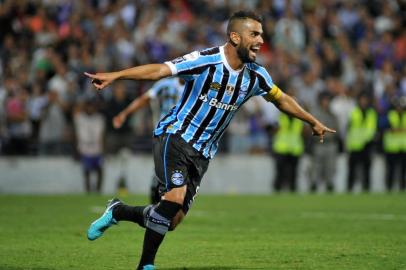  Brazilian Gremio Maicon celebrates after scoring against Uruguayan Defensor during a 2018 Copa Libertadores football match at the Luis Franzini Stadium in Montevideo, Uruguay on February 27, 2018.  / AFP PHOTO / Dante FERNANDEZEditoria: SPOLocal: MontevideoIndexador: DANTE FERNANDEZSecao: soccerFonte: AFPFotógrafo: STR